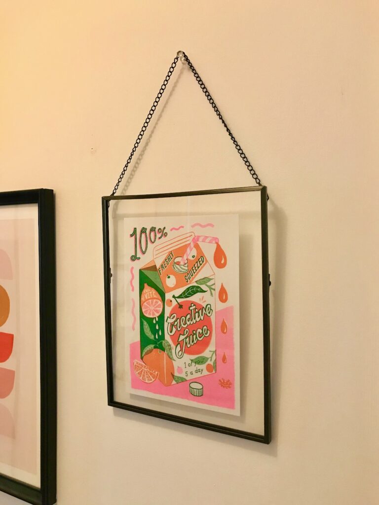 Art print in Ikea glass hanging frame